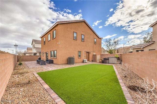 7948 Eastern Elk St, Las Vegas, NV 89149 - back of house with a fenced backyard, a patio, and stucco siding