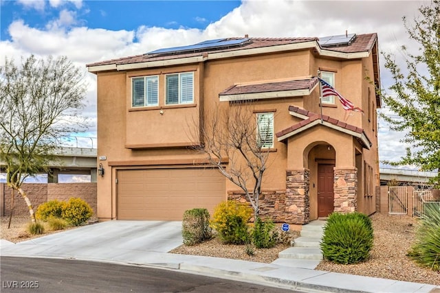 7948 Eastern Elk St, Las Vegas, NV 89149 - view of front facade featuring stucco siding, driveway, and roof mounted solar panels