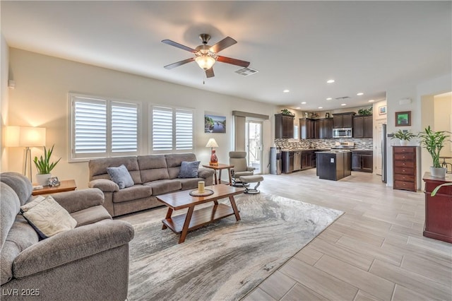 7948 Eastern Elk St, Las Vegas, NV 89149 - living room with ceiling fan and recessed lighting