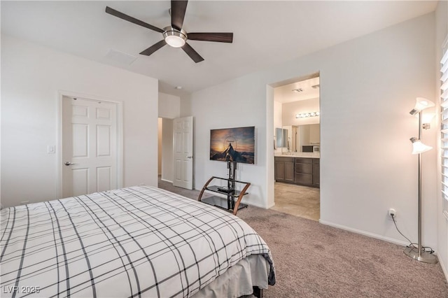 7948 Eastern Elk St, Las Vegas, NV 89149 - carpeted bedroom with ceiling fan and ensuite bath