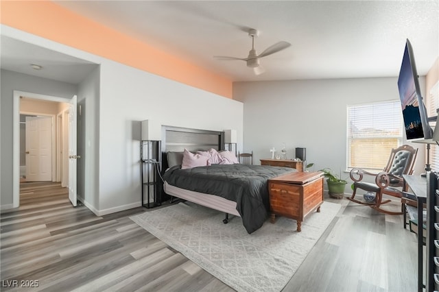 2230 Wagon Ave, Pahrump, NV 89048 - bedroom with light wood-style floors and ceiling fan