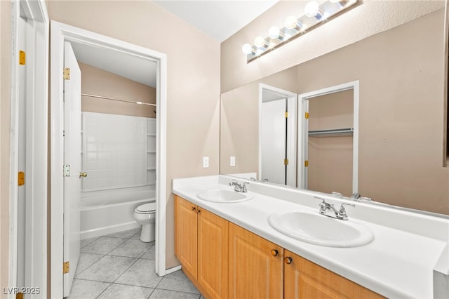 9338 Square Dance Pl Unit 101, Las Vegas, NV 89178 - bathroom with double vanity, tile patterned floors, and bathtub / shower combination