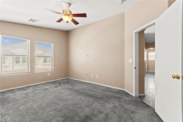 9338 Square Dance Pl Unit 101, Las Vegas, NV 89178 - carpeted empty room featuring ceiling fan and baseboards
