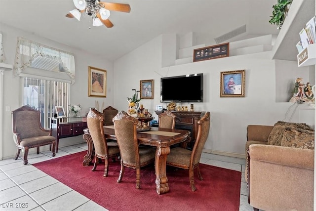 6292 Belgium Dr, Las Vegas, NV 89122 - dining area with tile patterned flooring, ceiling fan, and high vaulted ceiling