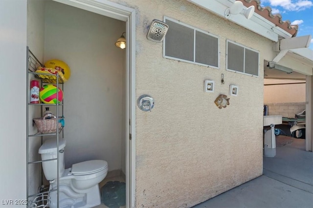 6292 Belgium Dr, Las Vegas, NV 89122 - view of side of property featuring stucco siding