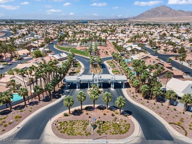 6292 Belgium Dr, Las Vegas, NV 89122 - aerial view of property and surrounding area featuring mountains and nearby suburban area