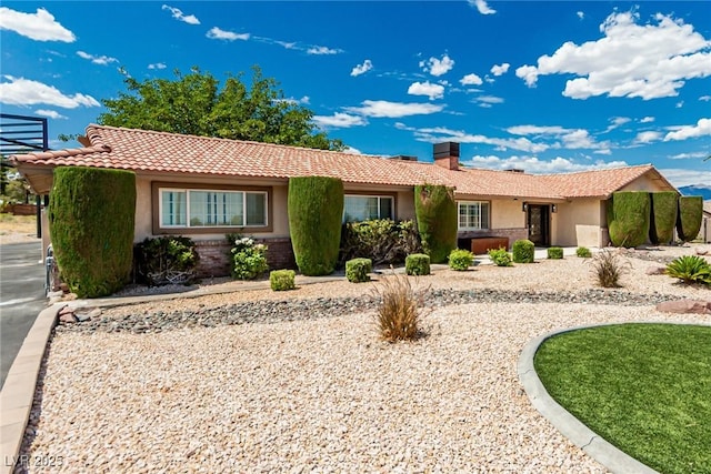 9660 W Ann Rd, Las Vegas, NV 89149 - single story home with stucco siding, a chimney, and a tiled roof