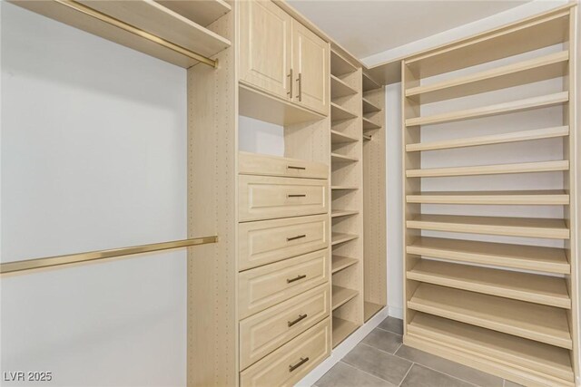 9660 W Ann Rd, Las Vegas, NV 89149 - walk in closet featuring tile patterned floors
