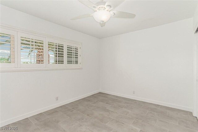 9660 W Ann Rd, Las Vegas, NV 89149 - empty room with baseboards and a ceiling fan