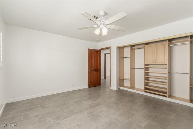 9660 W Ann Rd, Las Vegas, NV 89149 - unfurnished bedroom featuring a closet and ceiling fan
