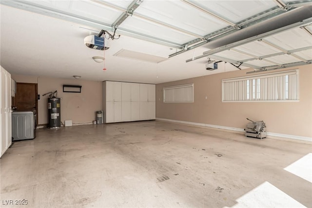 9660 W Ann Rd, Las Vegas, NV 89149 - garage with electric water heater and a garage door opener