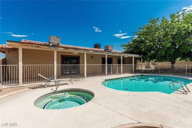 9660 W Ann Rd, Las Vegas, NV 89149 - view of swimming pool featuring an in-ground hot tub and a patio