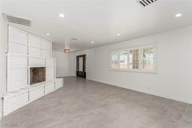 9660 W Ann Rd, Las Vegas, NV 89149 - unfurnished living room featuring recessed lighting and a fireplace
