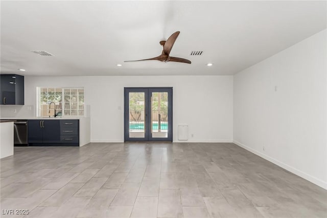 9660 W Ann Rd, Las Vegas, NV 89149 - unfurnished living room with a ceiling fan, recessed lighting, and french doors