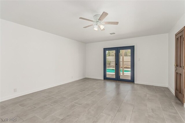 9660 W Ann Rd, Las Vegas, NV 89149 - unfurnished room featuring french doors and ceiling fan