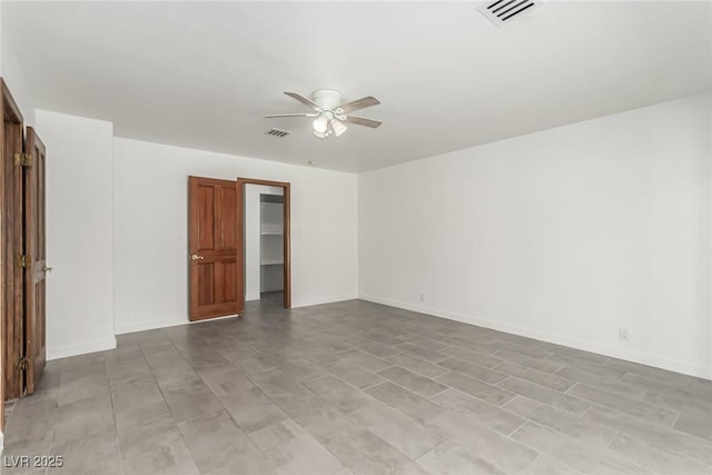 9660 W Ann Rd, Las Vegas, NV 89149 - unfurnished room featuring ceiling fan and baseboards