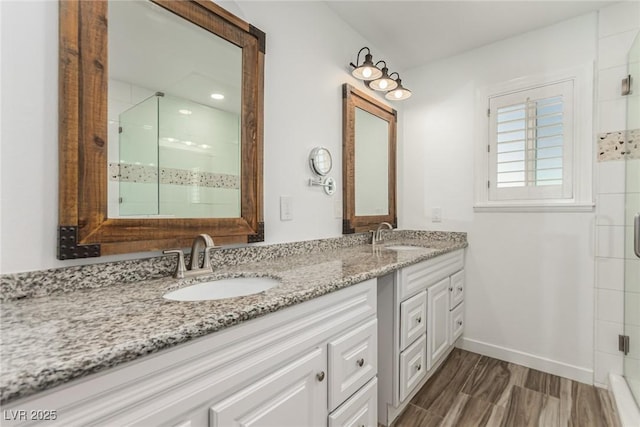 9660 W Ann Rd, Las Vegas, NV 89149 - full bath featuring a stall shower, double vanity, and wood finished floors