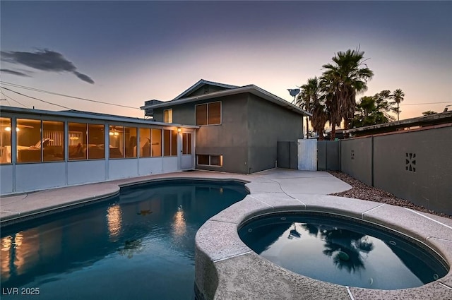 6213 Fairwood Ave, Las Vegas, NV 89107 - view of swimming pool featuring an in-ground hot tub and a sunroom