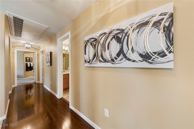 7701 W Robindale Rd Unit 274, Las Vegas, NV 89113 - hallway featuring attic access and dark wood-style flooring