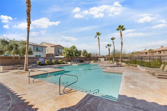 7701 W Robindale Rd Unit 274, Las Vegas, NV 89113 - community pool featuring a patio area