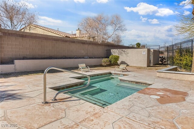 7701 W Robindale Rd Unit 274, Las Vegas, NV 89113 - view of swimming pool with a fenced backyard, a patio, and a pool