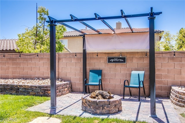 7445 Mezzanine View Ave, Las Vegas, NV 89178 - view of patio featuring a fire pit