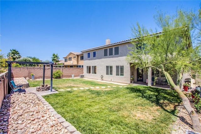 7445 Mezzanine View Ave, Las Vegas, NV 89178 - back of house featuring stucco siding, a chimney, a fenced backyard, and a patio