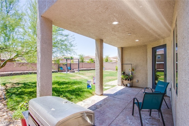 7445 Mezzanine View Ave, Las Vegas, NV 89178 - fenced backyard featuring a patio