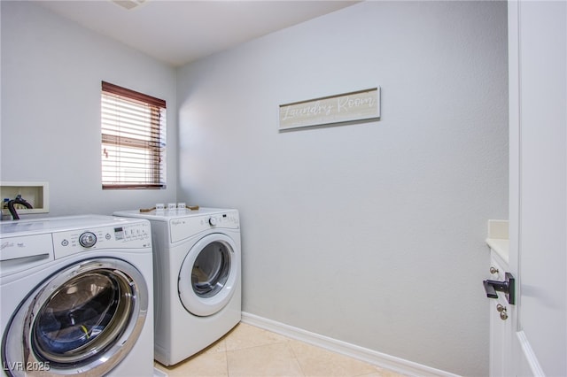 7445 Mezzanine View Ave, Las Vegas, NV 89178 - washroom featuring washer and clothes dryer and light tile patterned floors