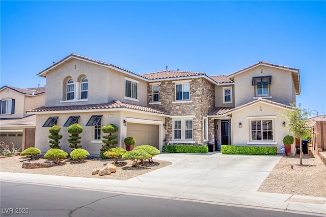 7445 Mezzanine View Ave, Las Vegas, NV 89178 - mediterranean / spanish-style house featuring a tile roof, an attached garage, stucco siding, stone siding, and concrete driveway