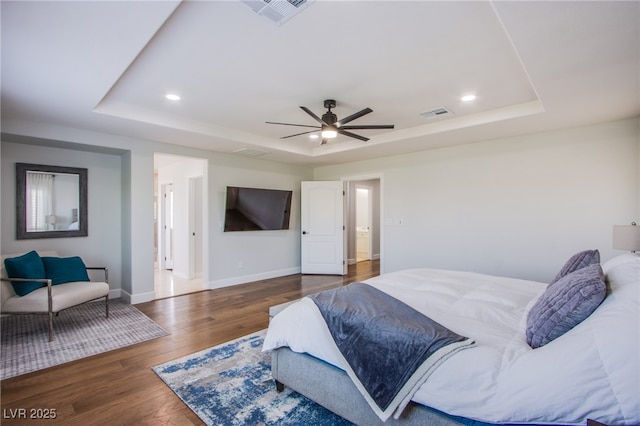 7445 Mezzanine View Ave, Las Vegas, NV 89178 - bedroom with a raised ceiling, wood finished floors, recessed lighting, and a ceiling fan