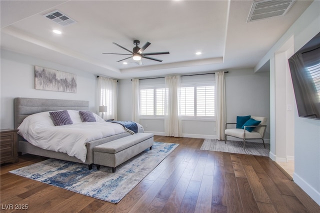 7445 Mezzanine View Ave, Las Vegas, NV 89178 - bedroom featuring a tray ceiling, wood-type flooring, recessed lighting, and ceiling fan
