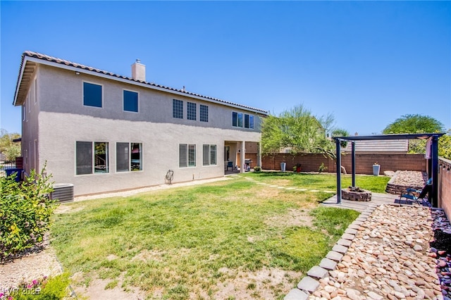 7445 Mezzanine View Ave, Las Vegas, NV 89178 - back of house with stucco siding, a fenced backyard, and a chimney