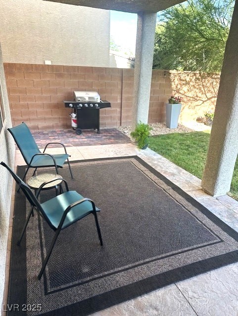 7445 Mezzanine View Ave, Las Vegas, NV 89178 - view of patio / terrace with grilling area