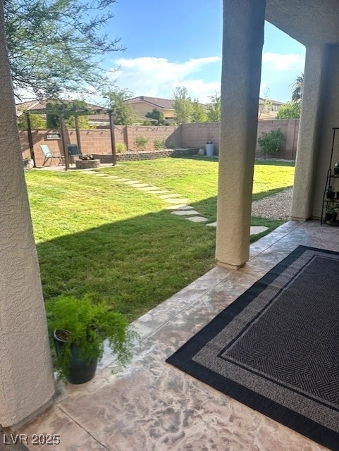7445 Mezzanine View Ave, Las Vegas, NV 89178 - fenced backyard featuring a patio area