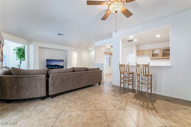 3029 Brownbirds Nest Dr, Henderson, NV 89052 - living area with ceiling fan, light tile patterned flooring, and recessed lighting