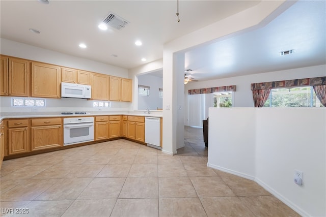 3029 Brownbirds Nest Dr, Henderson, NV 89052 - kitchen featuring white appliances, light countertops, light tile patterned flooring, ceiling fan, and recessed lighting