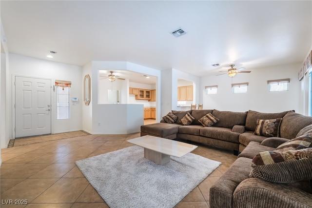 3029 Brownbirds Nest Dr, Henderson, NV 89052 - living room with a ceiling fan, light tile patterned flooring, plenty of natural light, and recessed lighting
