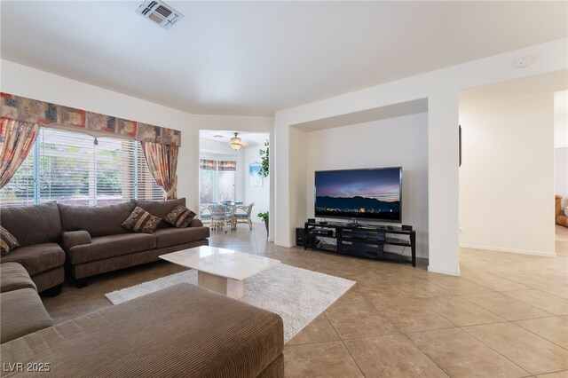 3029 Brownbirds Nest Dr, Henderson, NV 89052 - living area featuring light tile patterned floors and plenty of natural light
