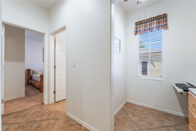 3029 Brownbirds Nest Dr, Henderson, NV 89052 - corridor with baseboards and light tile patterned flooring