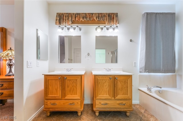 3029 Brownbirds Nest Dr, Henderson, NV 89052 - bathroom with two vanities, a garden tub, and tile patterned flooring