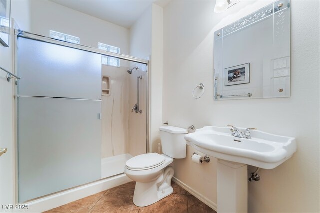 3029 Brownbirds Nest Dr, Henderson, NV 89052 - bathroom featuring a stall shower and tile patterned flooring