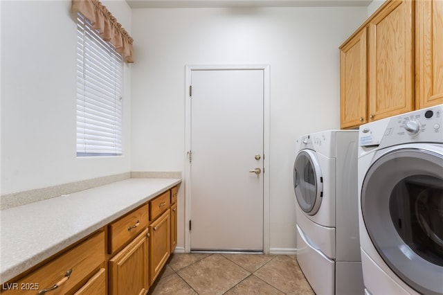 3029 Brownbirds Nest Dr, Henderson, NV 89052 - washroom with separate washer and dryer, cabinet space, and light tile patterned floors