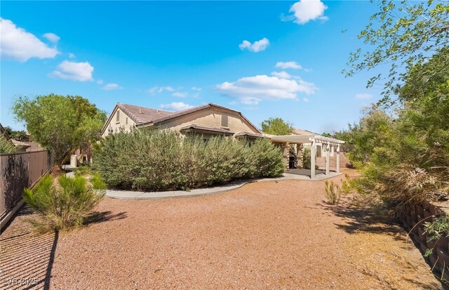3029 Brownbirds Nest Dr, Henderson, NV 89052 - view of home's exterior with a pergola