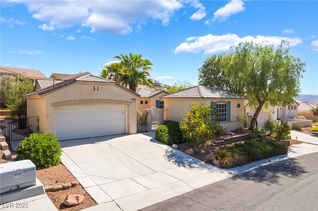 3029 Brownbirds Nest Dr, Henderson, NV 89052 - single story home featuring stucco siding, concrete driveway, a garage, and a tile roof