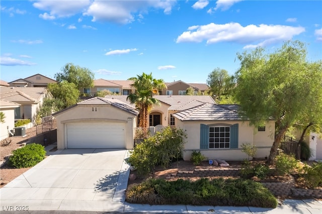 3029 Brownbirds Nest Dr, Henderson, NV 89052 - view of front of home featuring stucco siding, an attached garage, driveway, a residential view, and a tile roof