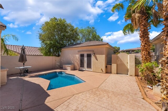 3029 Brownbirds Nest Dr, Henderson, NV 89052 - view of pool featuring french doors, a fenced backyard, a patio, and a gate