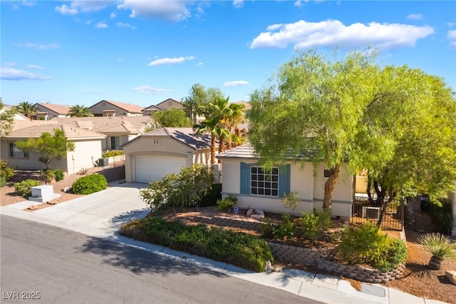3029 Brownbirds Nest Dr, Henderson, NV 89052 - view of front facade with a residential view, stucco siding, and concrete driveway