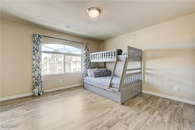 8565 Silver Coast St, Las Vegas, NV 89139 - bedroom featuring wood finished floors and baseboards