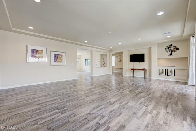 8565 Silver Coast St, Las Vegas, NV 89139 - unfurnished living room featuring light wood-type flooring and recessed lighting